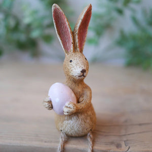 Shelf Sitting Rabbit With Pink Egg