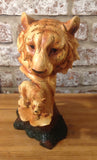 Wood Effect Lion Head And Cub