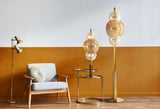 Ellipse 6 Light Floor Lamp Bronze Metal With Amber And Clear Glass